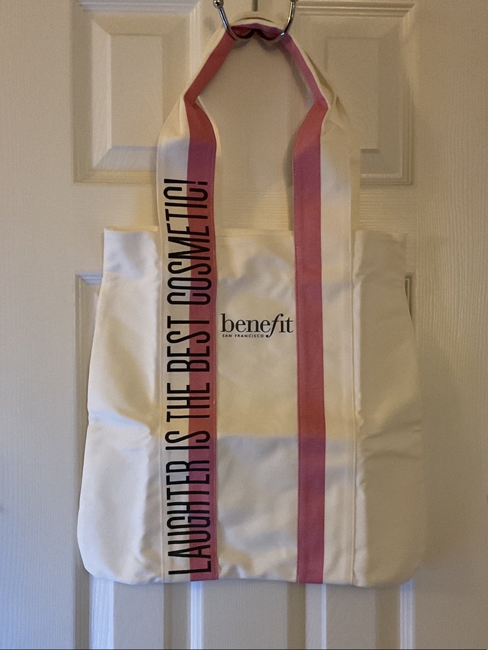 Benefit White Tote with Pink Accent Straps and Logo. Pins for bag included.